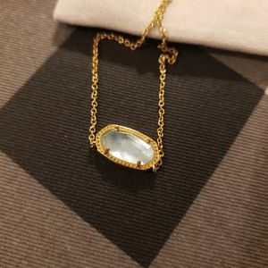 Elegant Gold and Blue Pendant Necklace